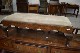 A late 19th or early 20th Century mahogany double footstool having Queen Anne style legs
