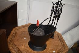 A modern coal helmet and companion stand