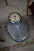 A set of vintage EKS bathroom scales