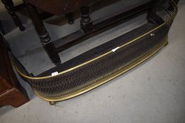 A 19th Century pierced brass fire fender