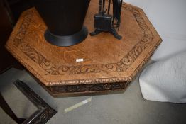 An interesting golden oak octagonal coffee table, possibly repurposed from small 19th Century dining