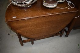An early to mid 20th Century oak twist gateleg dining table