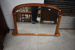 A modern pine overmantel mirror
