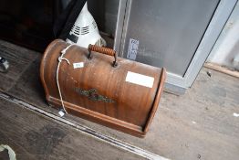A vintage Singer sewing machine in case