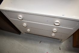 A vintage painted bedroom chest of three drawers