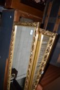 A pair of full length gilt frame wall mirrors