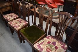 A set of four Georgian mahogany dining chairs