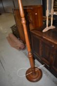 A traditional stained frame standard lamp