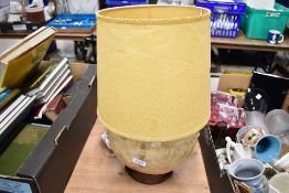 A mid century camel skin lamp
