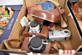 Three modern cameras including Yashica J, Exa Ihagee Dresden and a Sony Cyber shot