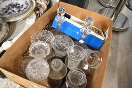A selection of clear cut glass wares including decanters