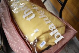 A selection of vintage throws and blankets