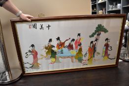 A large vintage Chinese embroidery using silk thread, depicting ten ladies relaxing, reading or
