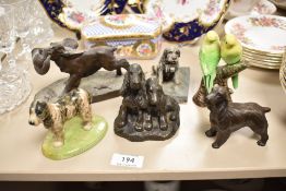 Three bronze effect composite spaniel studies, a Wade Spaniel and similar.