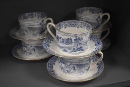 A set of modern Royal Tuscan breakfast tea cups and saucers with ploughing scene