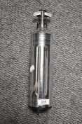 A 1960s Pyrene fire extinguisher and wall mount.