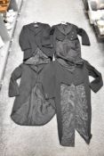 Four gents tail coats, dated 1922 and onwards.