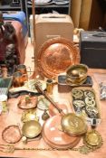 A selection of antique and later metal wares including copper plaque, post horn, horse brasses and