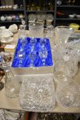 A boxed set of Edinburgh crystal wine glasses and a selection of vases, decanters and a fruit bowl.