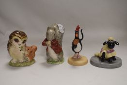 Two modern Mintons Wallace and Gromit figures and two Beatrix potter figures on brown stamps