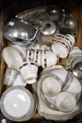 A selection of Royal Albert dinner ware having white ground with black motif and gilt detailing,