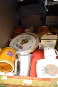 A mixed lot of books and ceramics.