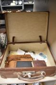 A small vintage case, a bible and a selection of Brooke bond tea cards.