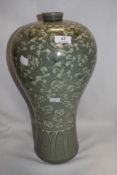 A large Korean Celadon glazed floor vase decorated with storks or crane 43cm tall