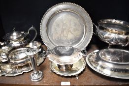 A selection of silver plated metal wares including three handle footed fruit bowl, tea set and