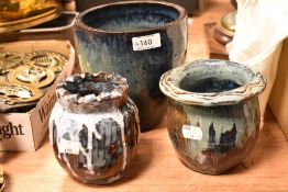 Three pieces of modern studio pottery including two vase and a planter