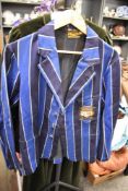 A 1930s striped school blazer having Barrow in Furness label reading E Todd and son.