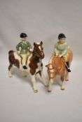Two Beswick studies, Boy on Pony, palomino 1500 and Girl on Pony, skewbald 1499