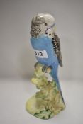 A Beswick study, Budgerigar, second version, facing left, no flowers on base, blue, 1216B