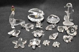 A selection of modern Swarovski silver crystal glass sea life studies including Puffer fish,