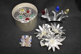 A selection of modern Swarovski silver crystal glass plant and flower studies with boxes