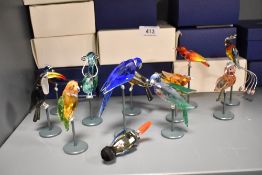Twelve modern Swarovski silver crystal glass studies of birds of paradise including Jonquil, Antique