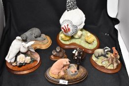 A collection of Border Fine Arts studies, some with boxes, including Hen and Chicks, Pig with