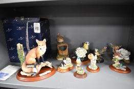 A selection of Border Fine Arts and similar figurines including Blue Tit and Hydrangea, and