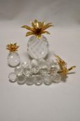 Three modern Swarovski silver crystal glass studies of fruit including grape bunch and pineapple