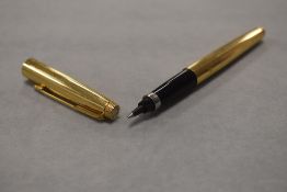 A Parker 75 rollerball pen in gold