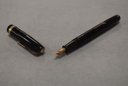 A Waterman W2 leverfill fountain pen in black with single broad decorated band to the cap having