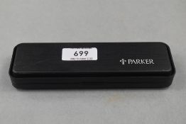A Parker 45 convertor fountain pen in black with lustiloy cap in original box