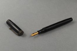 A Summit S125 leverfill fountain pen in black with single band to the cap having Summit 14ct nib.