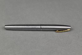 A Sheaffer rollerball pen in brushed steel with white spot to cap