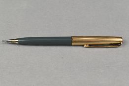 A Parker propelling pencil in dove grey with gold cap