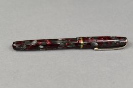 A Burnham B48 leverfill fountain pen in red and grey mable with single narrow band to cap having