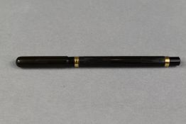 A Mabie Todd Swan 3201 eyedropper fountain pen in BHR with clipless cap and gold band to top and