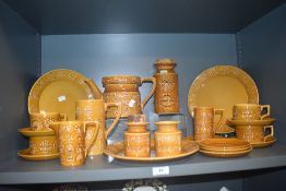 A selection of mid century Portmeirion Totem pattern tea and dinner wares