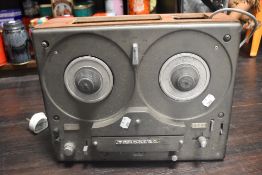A Tandberg cross field reel to reel tape recorder.