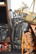 A set of modern golf clubs with bag etc